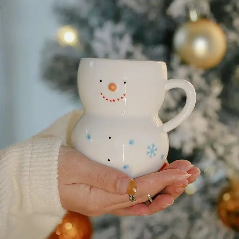 Snømannkrus til jul vist fra siden