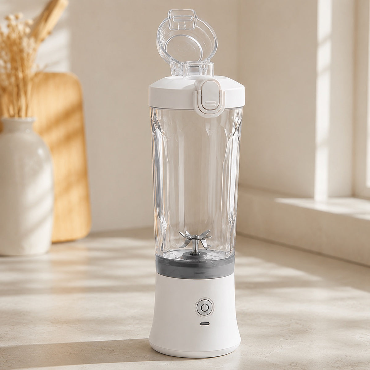 Hvid bærbar blender A9 med åbent drikkelåg og betjening