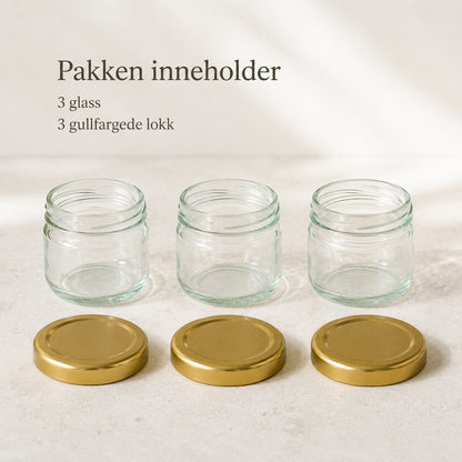 Pakken indeholder tre mini-syltetøjsglas og tre guldfarvede låg