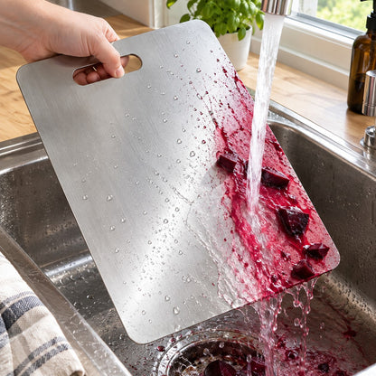 Beetroot juice rinsing straight off the smooth metal surface